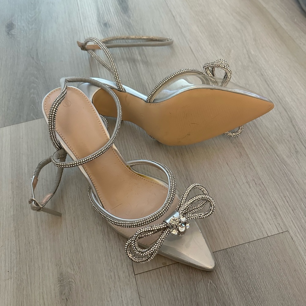 Brand new silver/clear ankle wrap heel